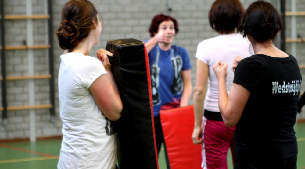 Slide 2: Workshop Kickboksen